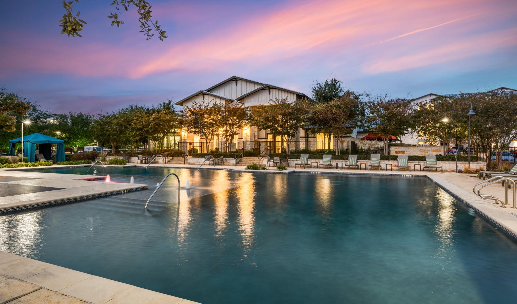 a pool in front of a building