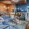 a living room with a blue wall