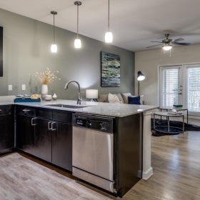 a kitchen with black appliances